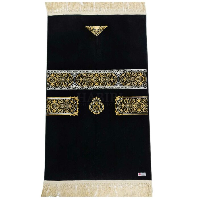 PREMIUM Black Kaaba Islamic Prayer Mat Janamaz Musallah Rug 1000g. Brand new style prayer mat High Quality New Design Product of Saudi Arabia by Minwal Soft smooth prayer mat Brand new arrival. Available in: Black Approx. Dimensions: 70X114CM Approx. Weight: 1050g