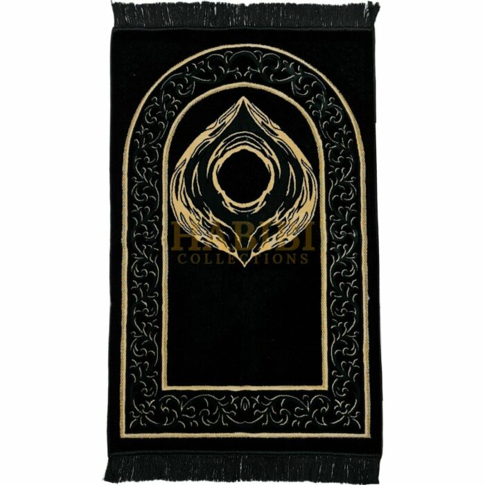 Hajar Aswad Black Stone Kaaba Islamic Prayer Mat from Turkey. Extremely soft with a lovely, soft feel. Makes an ideal gift for a family or masjid where there are many people praying. Present this to someone who prays their five daily prayers and your reward will be ongoing. New design prayer mat based on beautiful patterns. The mat weights approximately 780g. Comes nicely packed with beautiful plastic wrap/bag or label wrap. Dimensions (approx.): 27.5" X 43.5"